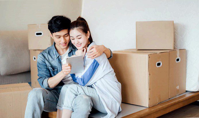 young couple moving in